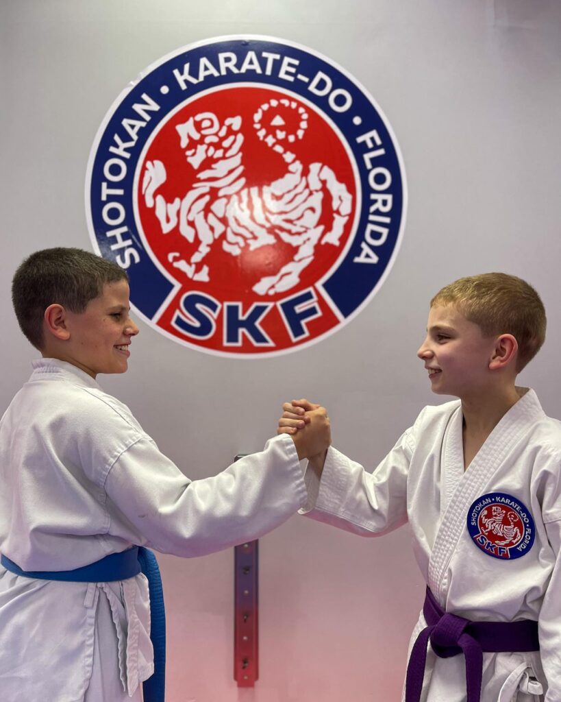 Students showing respect to each other in class