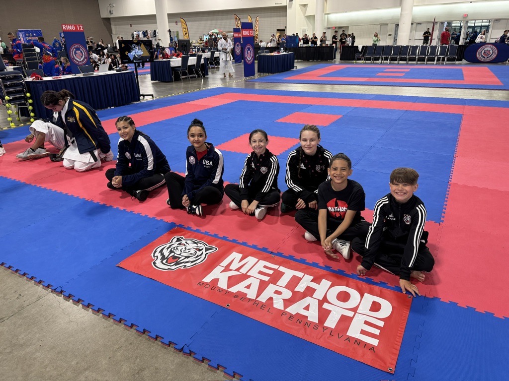 Method Karate students smiling at competition